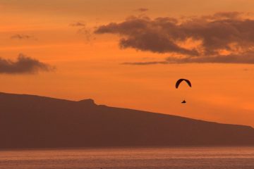 Paragliding on sunset