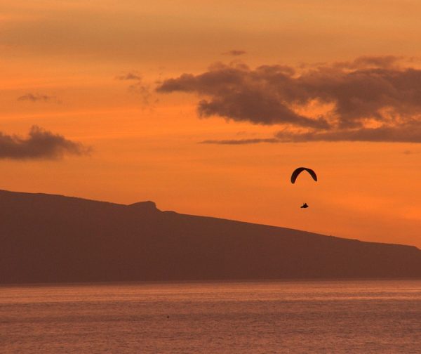 Paragliding on sunset